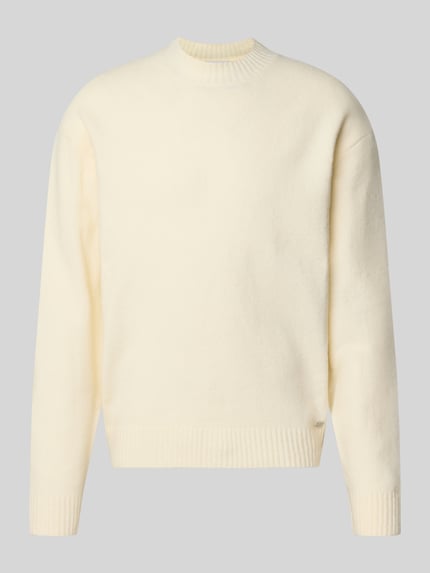 Produktfoto, Relaxed Fit Strickpullover aus Material-Mix mit Baumwoll-Anteil von REVIEW in Creme mit Stehkragen und elastischen Abschlüssen