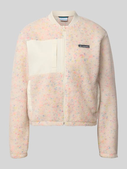 Produktfoto, Regular Fit Jacke mit Stehkragen von Columbia, Damen Fleecejacke mit Logo-Patch, helles Creme mit bunten Sprenkeln, glatte und flauschige Textur, Napoleon- und Eingrifftaschen, Reißverschluss, Rückenlänge 49 cm, Schulterbreite 44 cm, Brustweite 50 cm, Ärmellänge 61 cm