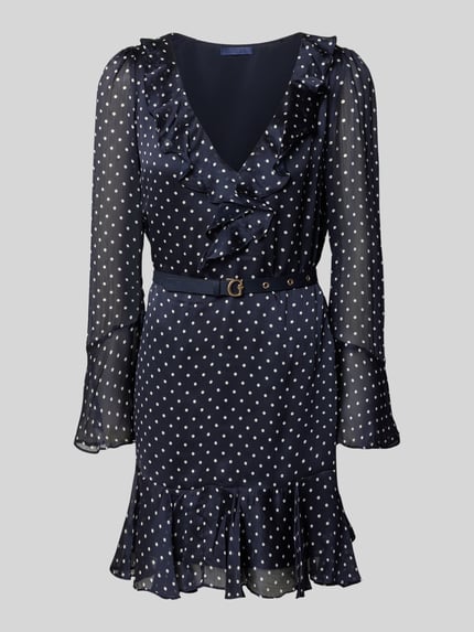 Produktfoto, Minikleid mit Rüschenbesatz von GUESS, taillierte Passform, abnehmbarer Taillengürtel, V-Ausschnitt, langärmeliges Design, Rückenlänge 83 cm, Brustweite 42 cm, Ärmellänge 62 cm, dunkelblau mit weißen Punkten, leicht transparente Textur