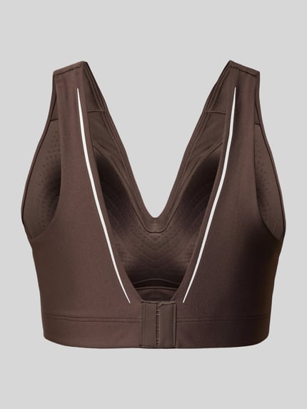 Produktfoto, Sport-BH mit Kontraststreifen von Under Armour, braun mit weißen Linien, glatte stoftextuur, Dames Sport-BH von Under Armour