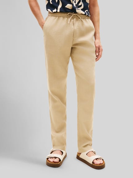 Tommy Hilfiger Chino o kroju tapered z mieszanki lnu ze ściągaczem w pasie model 'HARLEM' Beżowy 4