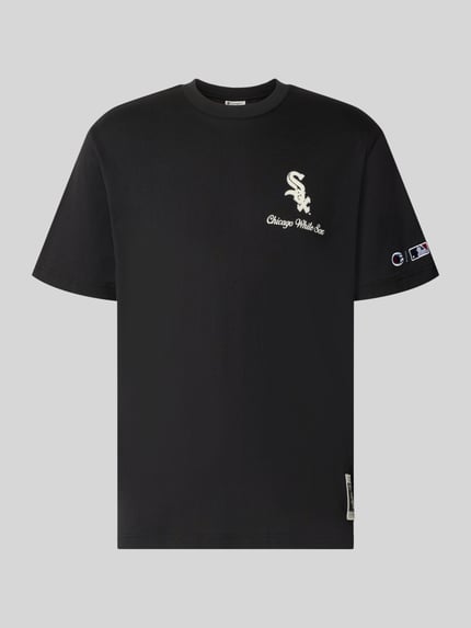 Produktfoto, Relaxed Fit T-Shirt aus reiner Baumwolle von Champion in Schwarz mit Statement-Print, Label-Stitching und weißem Logo