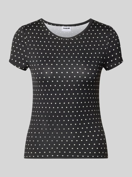 Produktfoto, damski t-shirt z mieszanki materiałów z dodatkiem streczu, krój slim fit, model 'DESTINY' od Noisy May, okrągły dekolt, długość tyłu w rozmiarze S: 51 cm, czarne tło z białymi kropkami, gładka tekstura