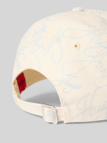 Produktfoto, Basecap aus reiner Baumwolle Modell 'ALLY' von HUGO, Optik:Allover-Muster mit Label-Schriftzug, verstellbarer Riegel, Materialverarbeitung: Twill