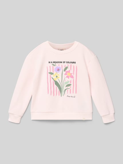 Produktfoto, Regular Fit Sweatshirt aus Baumwoll-Mix Modell 'GRUTHALINA' von ONLY, Optik: Unifarben, Motiv-Print, Crew Neck, Langarm, gerippte Abschlüsse, kinder, Sweat, hellrosa mit buntem Blumenmotiv auf glatter Textur.