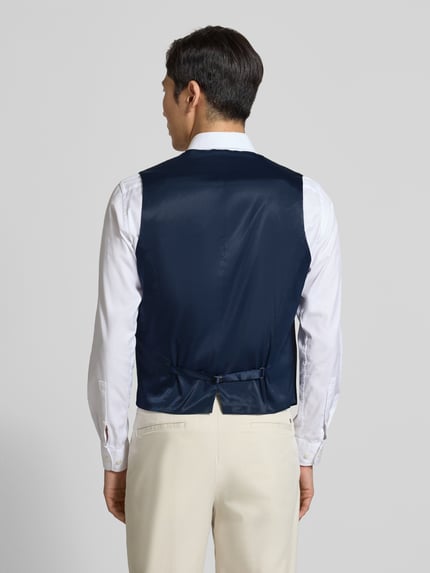 Männermodel trägt Regular Fit Anzugweste aus Woll-Mix Modell 'VIN253X-MH' van HUGO in effen donkerblauw, Ganzkörperansicht Rückansicht.