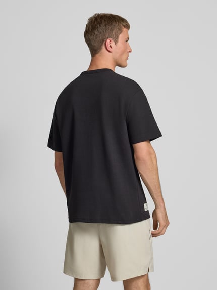PUMA Performance Relaxed Fit T-Shirt mit Brusttasche Black 5