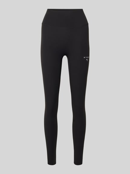 Produktfoto, czarne legginsy z elastycznym pasem, dopasowany krój, mieszanka materiałów z dodatkiem streczu, model 'PUMA x HYROX SHAPELUXE' od PUMA, logo