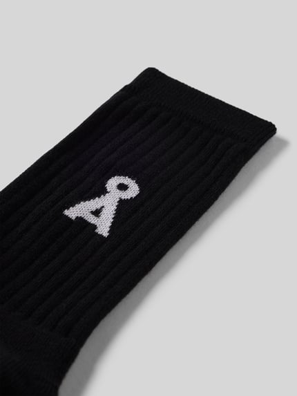 Productfoto, Sokken uit katoenmix model 'SAAMUS BOLD' van Armedangels, zwart, uni, labeldetail, ribgebreide boord, stretchmateriaal.