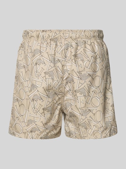 Produktfoto, Regular Fit Shorts mit Allover-Logo-Print von Emporio Armani in Beige mit elastischem Bund und Tunnelzug, grafisches Muster