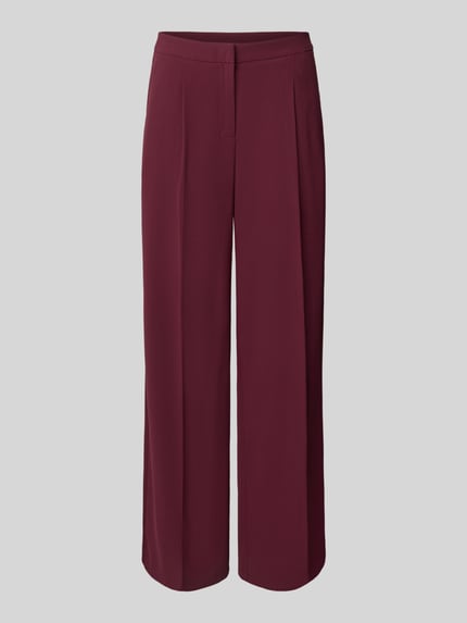 Spodnie o luźnym kroju z zakładkami w pasie i bocznymi, wpuszczanymi kieszeniami model ‘TINNI’ Shop The Look MANNEQUINE
