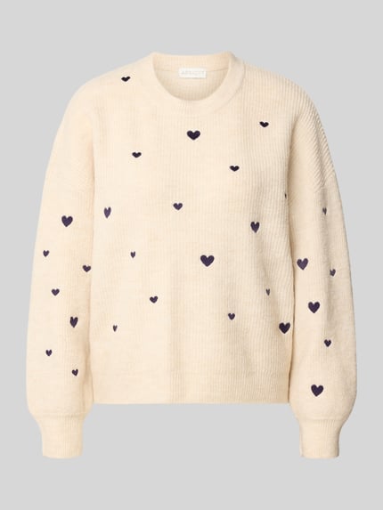 Produktfoto, Strickpullover mit Woll-Anteil von Apricot in Creme mit dunklen Herz-Motiven, Ripp-Optik, lockere Passform, Damenmode