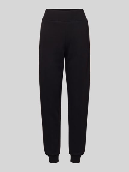 Produktfoto, czarne spodnie dresowe z bawełnianej mieszanki, luźny krój, elastyczny pas, kieszenie francuskie, Sweatpants mit elastischem Bund Modell 'BRITNEY' od Guess Activewear