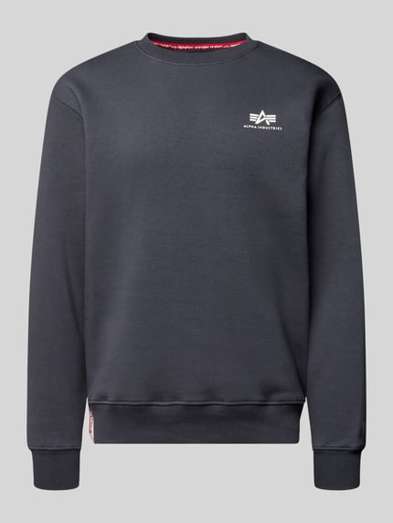 Produktfoto, Sweatshirt met geribde afwerkingen van Alpha Industries, katoenmix, los model, ronde hals, labeldetails, donkere effen kleur.