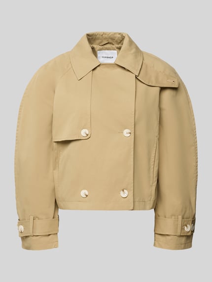 Produktfoto, beige Trenchcoat mit mouwriempjes, knoopsluiting, reverskraag, regular fit, model 'MIA' van Topshop, katoen