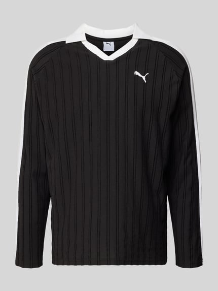 Produktfoto, Relaxed Fit Polo-Longsleeve mit Label-Stitching von PUMA PERFORMANCE, reine Baumwolle, schwarzes Oberteil mit weißen Details, V-Ausschnitt, Polokragen, strukturierte Oberfläche, für Herren
