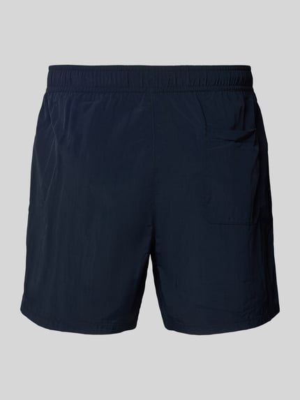 Produktfoto, Regular Fit Badehose mit Logo Stitching von Tommy Hilfiger, Optik: Unifarben, Bundabschluss: Tunnelzug, seitliche Eingrifftaschen vorne, aufgesetzte Tasche hinten