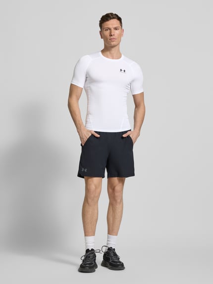 Under Armour T-shirt z o kroju slim fit z nadrukiem z logo Biały 1