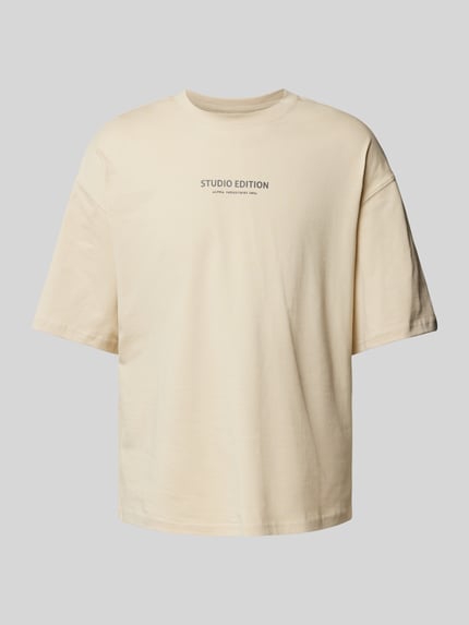 Alpha Industries T-shirt z nadrukiem z logo model ‘Studio Edition’ Złamany biały 2