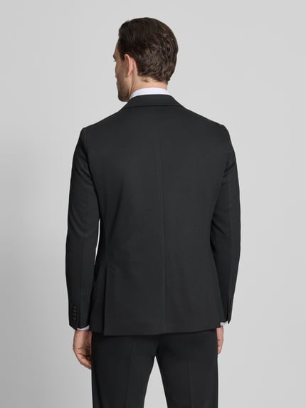 Mannemodel draagt Extra Slim Fit Anzug in unifarbenes Design van Roy Robson, zwart, viscosemix met stretch, 2-knoops colbert, klepzakken, pantalon met persplooien en steekzakken, ruglengte 73 cm, schouderbreedte 42 cm, mouwlengte 65 cm, binnenbeenlengte 80 cm, effen kleuren, ganzkörperansicht rückansicht.