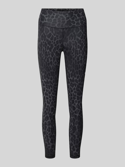 Produktfoto, schwarze Skinny Fit Sport-Leggings mit Animal-Print von PUMA Performance, Struktur zeigt feines Leopardenmuster