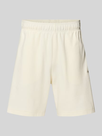 Produktfoto, Shorts mit Label-Stitching mit elastischem Bund von CHAMPION in Creme, Baumwoll-Mix, Regular Fit, glatte Textur, neutrale Farbe.