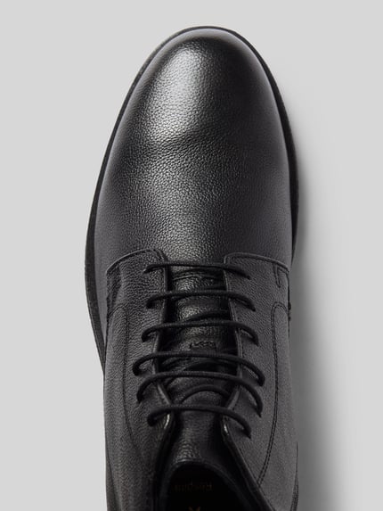 Produktfoto, strukturierte schwarze Oberfläche, abgerundete Form, Schnür- und Reißverschluss, Boots mit Reißverschluss Modell 'SAHARO' von Geox, Kontext: Herren Boots, strukturierte Sohle, Absatzhöhe 3 cm, Schafthöhe 13 cm, Schaftweite 8 cm