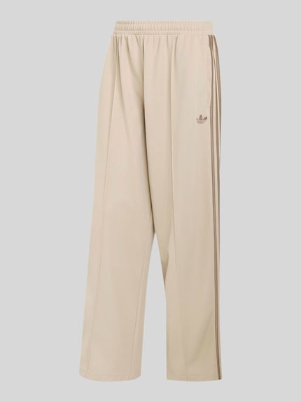 adidas Originals Spodnie dresowe o kroju loose fit z mieszanka bawełny z kantami Piaskowy 2