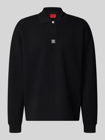 Produktfoto, czarna bluza Oversize Fit Sweatshirt aus Baumwoll-Mix model 'Dabins' von HUGO, gładka faktura, kontekst: bluza męska od HUGO