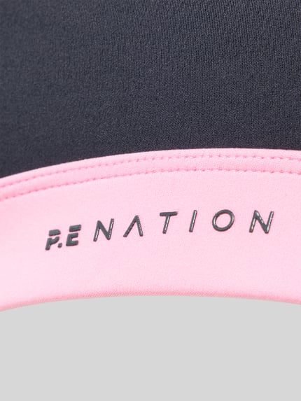 Produktfoto, Sport-BH mit Logo-Print Modell 'ACTIVE' von P.E Nation aus elastischem Material-Mix in Schwarz und Rosa, glatte Textur