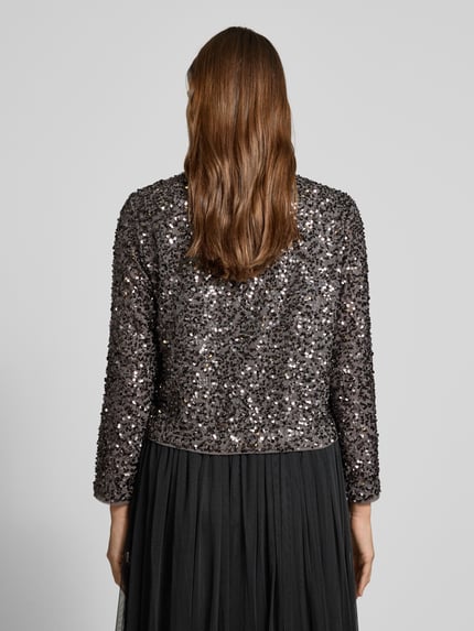 Vrouwenmodel draagt Blazer met Pailletten en Rundhalsausschnitt Modell 'EXPLORE' van comma, zwartgrijs, regular fit, rugaanzicht.