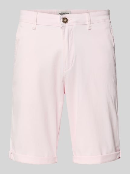Produktfoto, Straight Fit Shorts mit Eingrifftaschen Modell 'Bowie' von Jack & Jones in zartem Rosa, Baumwoll-Mix, sichtbarer Knopfverschluss, klare Linien, Hosenschlitz mit Reißverschluss, abgesteppte Kanten, klassische Länge, Eingriff- und Gesäßtaschen, elastischer Bund, geeignet für Freizeit-Looks.