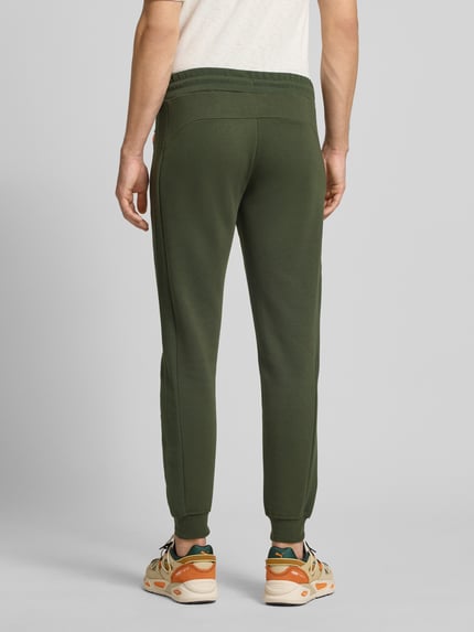 JACK & JONES Spodnie dresowe o kroju slim fit z nadrukiem z logo model ‘Gordon’ Oliwkowy 5