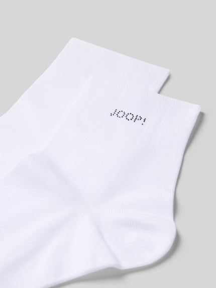 Produktfoto, weiße Socken mit Strasssteinbesatz von JOOP!, Baumwoll-Mix mit Modal-Anteil, Logo-Detail und elastischer Bund.