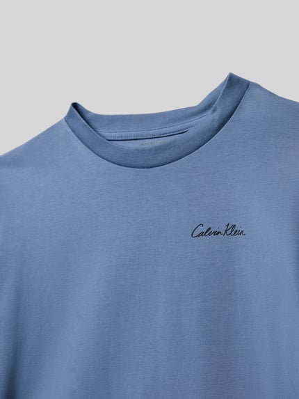 Productfoto, Regular Fit T-Shirt met logo-print model 'Polaroid' van Calvin Klein Jeans, lichtblauw katoenmix, ronde hals, gladde textuur.