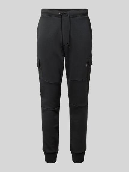 Produktfoto, Sweatpants mit elastischem Bund von Polo Ralph Lauren aus Baumwoll-Elasthan-Mix, lockerer Schnitt, Label-Detail, schwarze Farbe