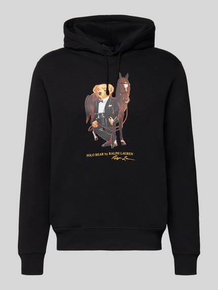 Produktfoto, Hoodie mit Label-Print van Polo Ralph Lauren in zwart katoenmix, los model, capuchon met tunnelkoord en ribboorden.