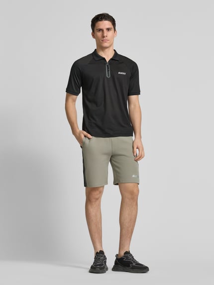 GUESS Activewear Regular Fit Poloshirt mit Reißverschluss Modell 'JAISS' BLACK 1