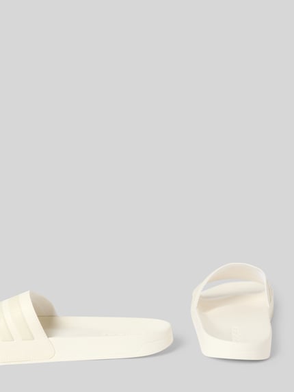 adidas Sportswear Klapki kąpielowe z napisem z logo model 'ADILETTE SHOWER' Złamany biały 2
