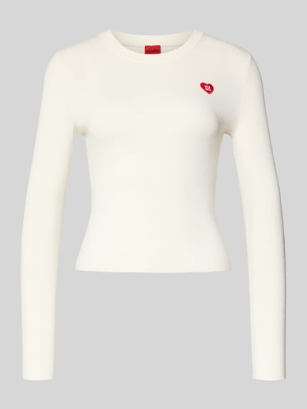 Produktfoto, Slim Fit Strickshirt aus Viskose-Mix Modell 'SHARPA' von HUGO w kolorze jednolitym, faktura prążkowana, długi rękaw, naszywka z logo.
