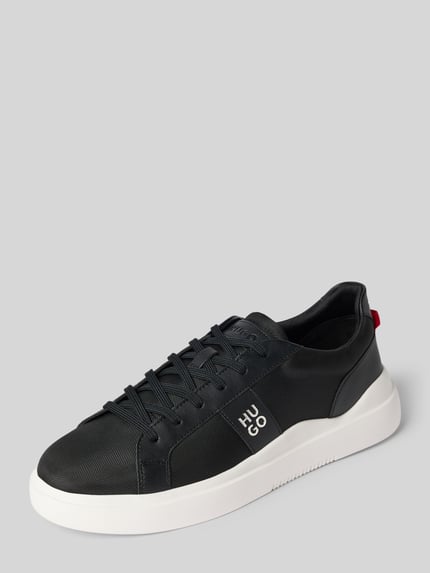 Produktfoto, Sneaker mit Label-Datei Modell 'Blake_tenn_blnypu' von HUGO in Schwarz mit weißen Sohlen, glatte Textur, Herren Sneaker von HUGO.