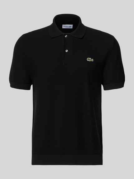 Produktfoto, Regular Fit Poloshirt aus reiner Baumwolle von Lacoste in Schwarz, unifarben, Kurzarm, Logo-Stitching, gerippte Abschlüsse, Querstrick-Struktur