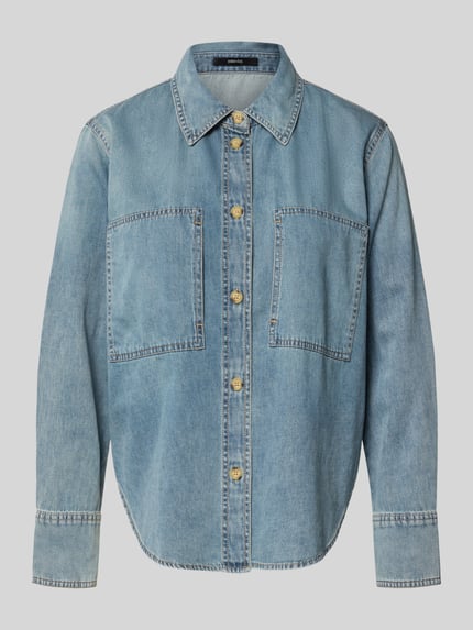 Produktfoto, Hemdbluse in Denim-Optik Modell 'Zutie' von Someday aus reiner Baumwolle, locker geschnitten, blaue Farbe, sichtbare Knopfleiste, zwei große Brusttaschen, strukturierte Oberfläche.