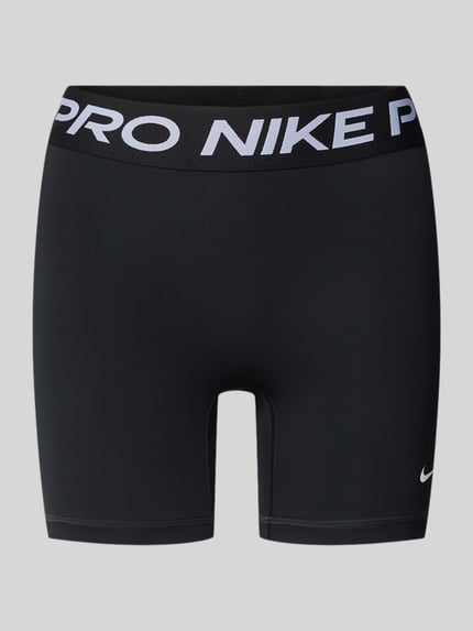 Produktfoto, Radlerhose mit elastischem Bund und Logo von NIKE TRAINING, Schwarz, Material-Mix mit Stretch-Anteil, körpernahe Passform, Label-Details am Bund, Logo, Bundweite 33 cm, Innenbeinlänge 12 cm, glatte Textur