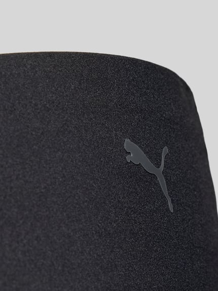 Produktfoto, Slip mit Logo und elastischem Bund von PUMA im schwarzen Material-Mix mit Stretch-Anteil, glatte Struktur, körpernahe Passform