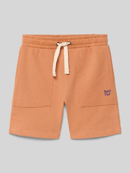 Productfoto, Shorts met elastische band en steekzakken van Blue Seven, puur katoen, regular fit, bandwijdte maat 116: 29 cm, binnenbeenlengte 12 cm, kindermaten, zandkleur, rechte pijpen, zachte katoenstructuur.