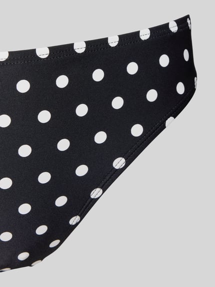 Produktfoto, High Leg Bikini-Slip Modell 'CLASSIC DOT' von Michael Kors im Allover-Look mit weißen Polka-Dots auf schwarzem Material-Mix mit Stretch-Anteil, körpernahe Passform