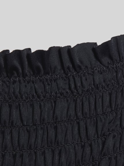 Produktfoto, Bikini-Slip Modell 'SKIN LOBSTER' von Neo Noir aus schwarzem Material-Mix mit Stretch-Anteil, Strukturmuster und Wellensaum