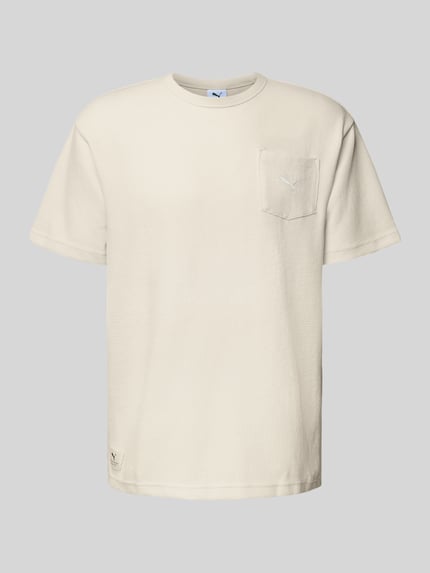 PUMA Performance Relaxed Fit T-Shirt mit Brusttasche Offwhite 2