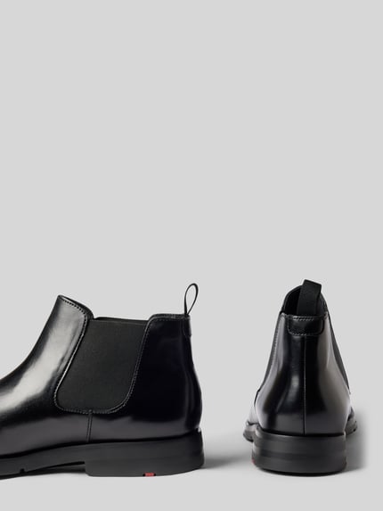 Produktfoto, Chelsea Boots aus Leder Modell 'EEZY PLUS' von LLOYD in Schwarz, abgerundete Spitze, elastische Einsätze, glatte Textur, Absatzhöhe 3 cm, Schafthöhe 10 cm, Schaftweite 11 cm